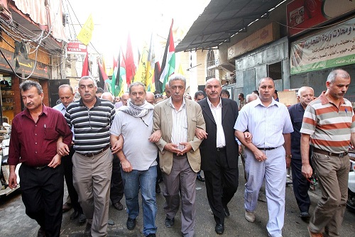 مسيرة جماهيرية في مخيم برج البراجنة بالذكرى التاسعة لإستشهاد الرئيس ياسر عرفات